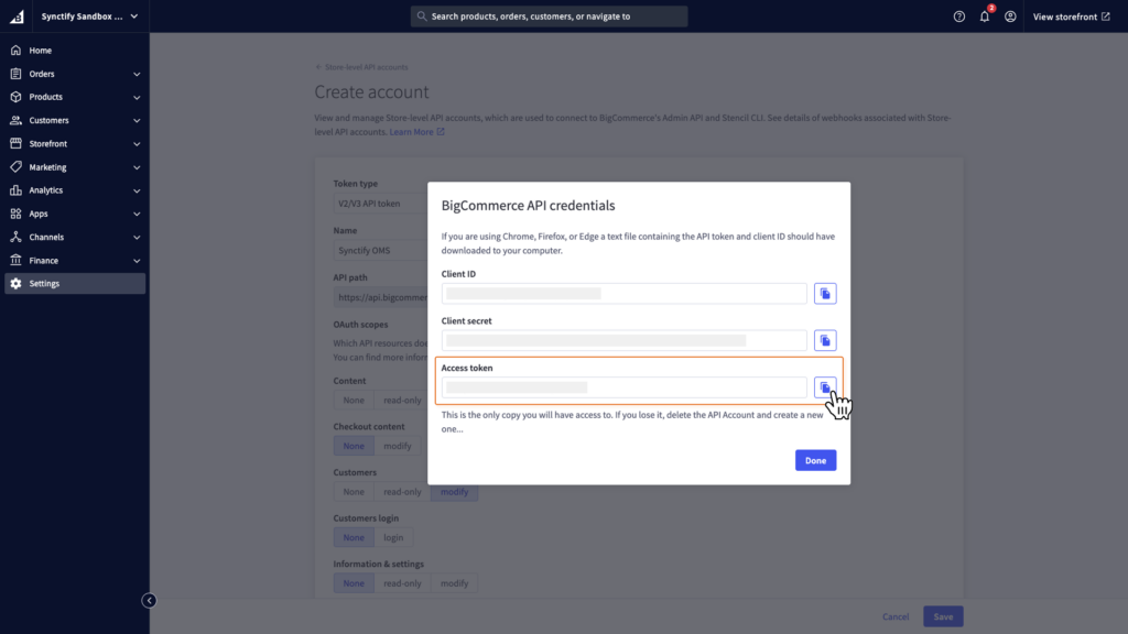 BigCommerce API credentials window showing the Client ID, Client secret, and Access token fields with sensitive values hidden.